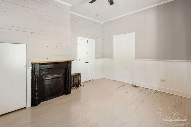 an empty room with a fireplace