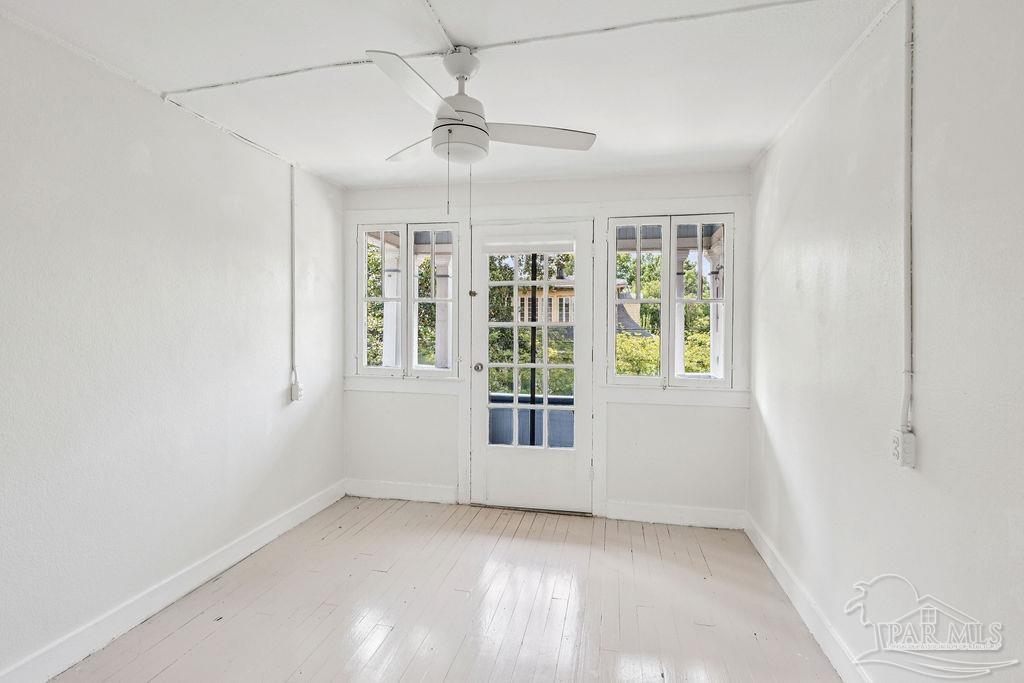 600 East Jackson Street Pensacola, FL 32501 - Photo 20 of 45 a view of an empty room with a window