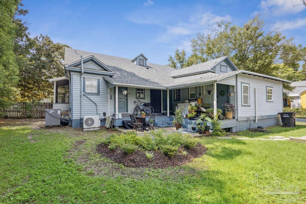 600 East Jackson Street Pensacola, FL 32501 - Photo 42 of 45 a view of a house with backyard porch and sitting area