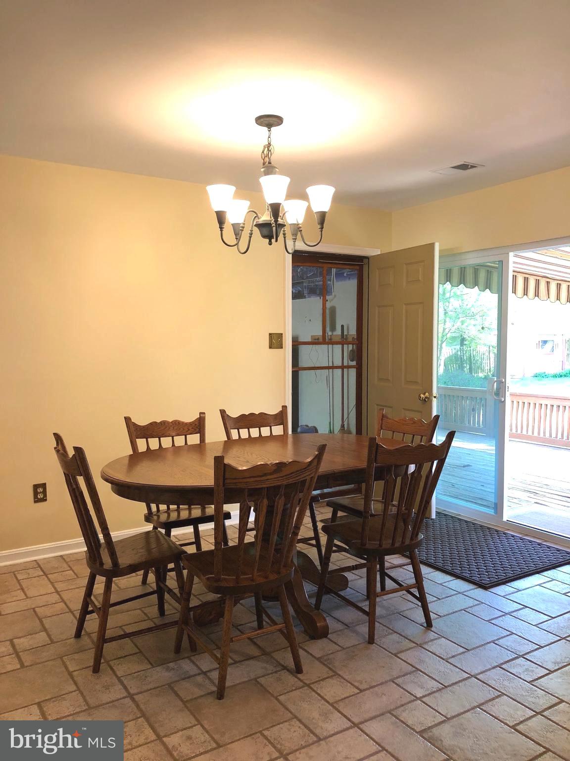 5 Cypress Point Road Felton, PA 17322 - Photo 7 of 29 Kitchen View to Garage & Deck