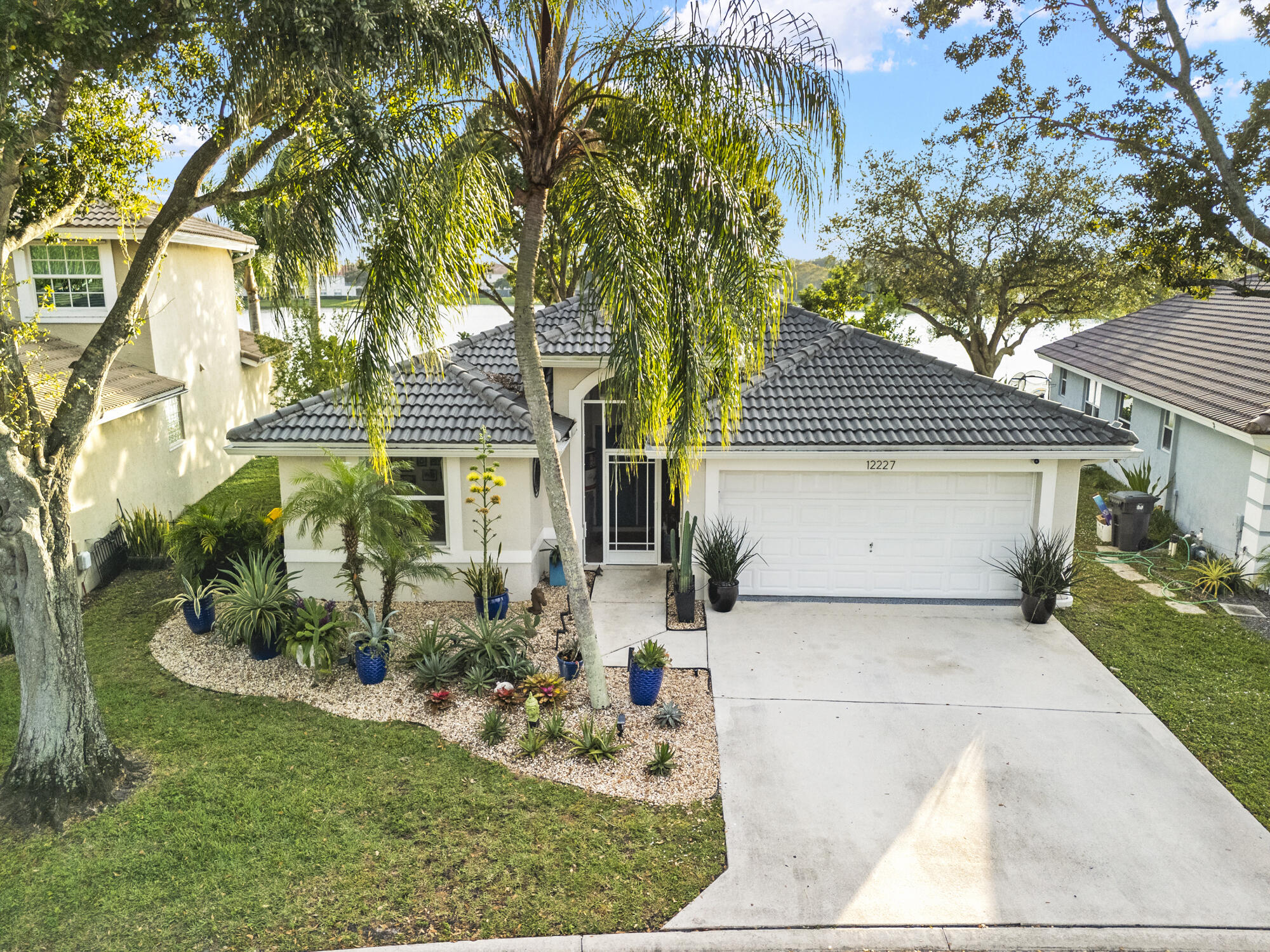 12227 Sunset Point Circle Wellington, FL 33414 - Photo 28 of 39 View of the front