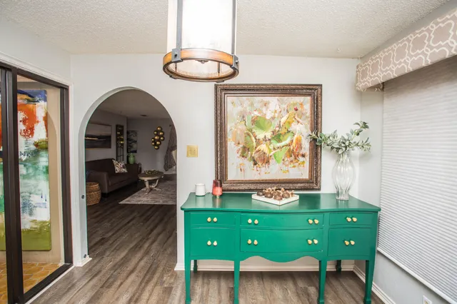 a view of a hallway view with staircase