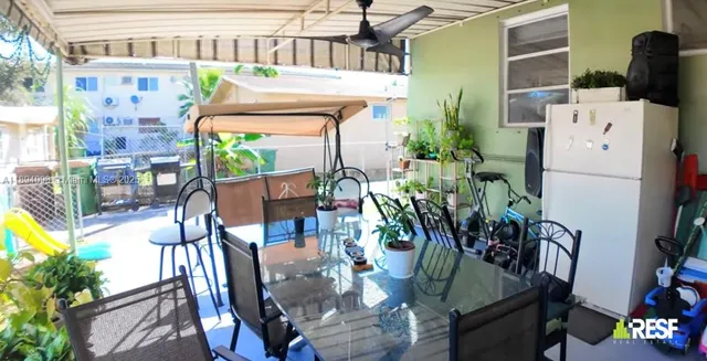 a group of people sitting in a living room