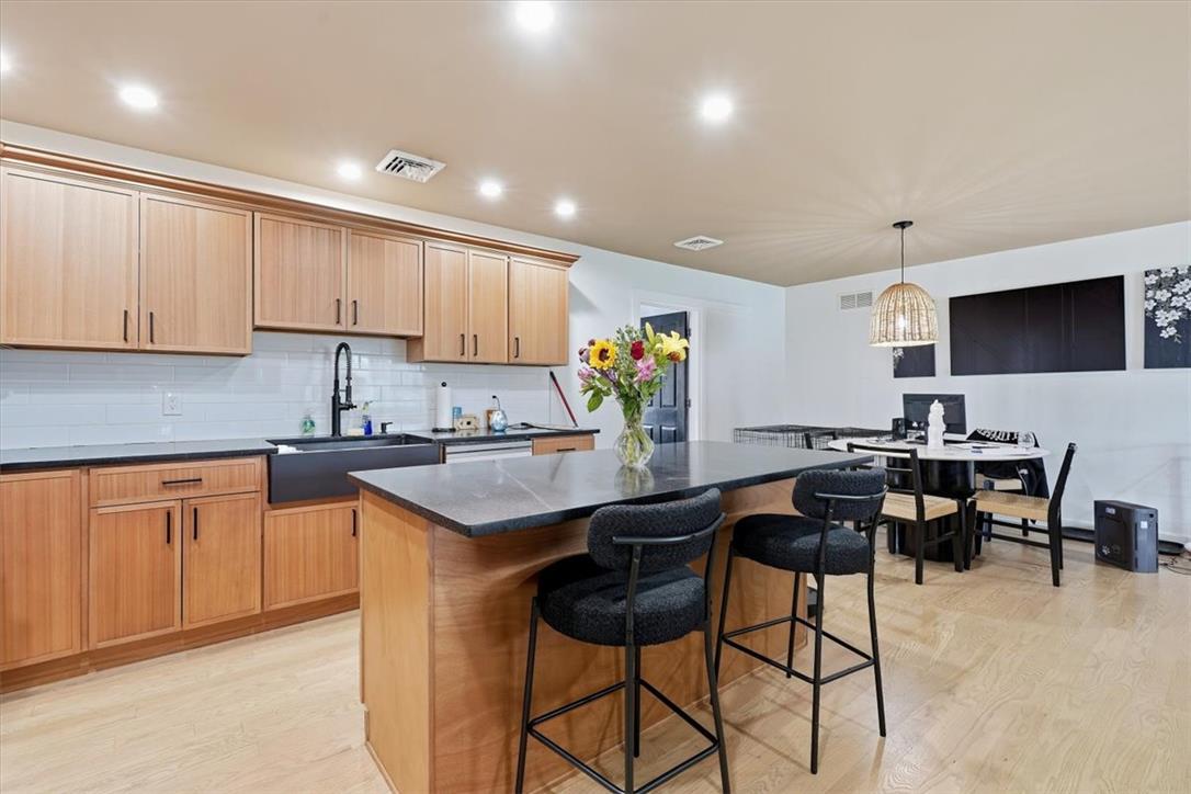 2930 Oakland Road Bethlehem, PA 18017 - Photo 51 of 55 Gleaming hardwood floors and a spacious center island anchor this open-concept kitchen space.