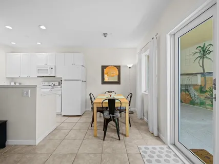 a work place with a chair and dining table