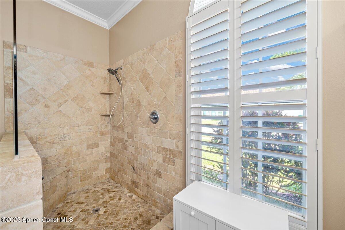 171 Seaview Street Melbourne Beach, FL 32951 - Photo 21 of 44 a bathroom with a sink and a shower curtain