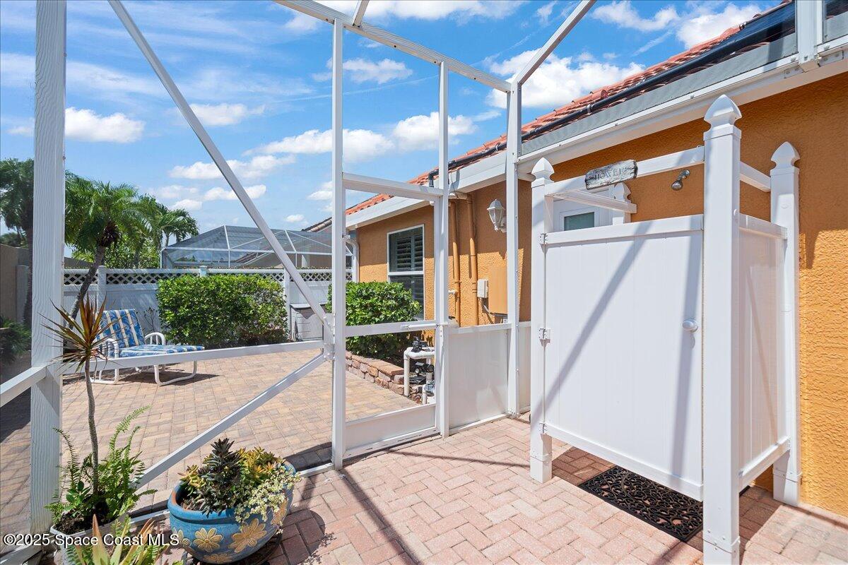 171 Seaview Street Melbourne Beach, FL 32951 - Photo 32 of 44 a view of a porch with furniture