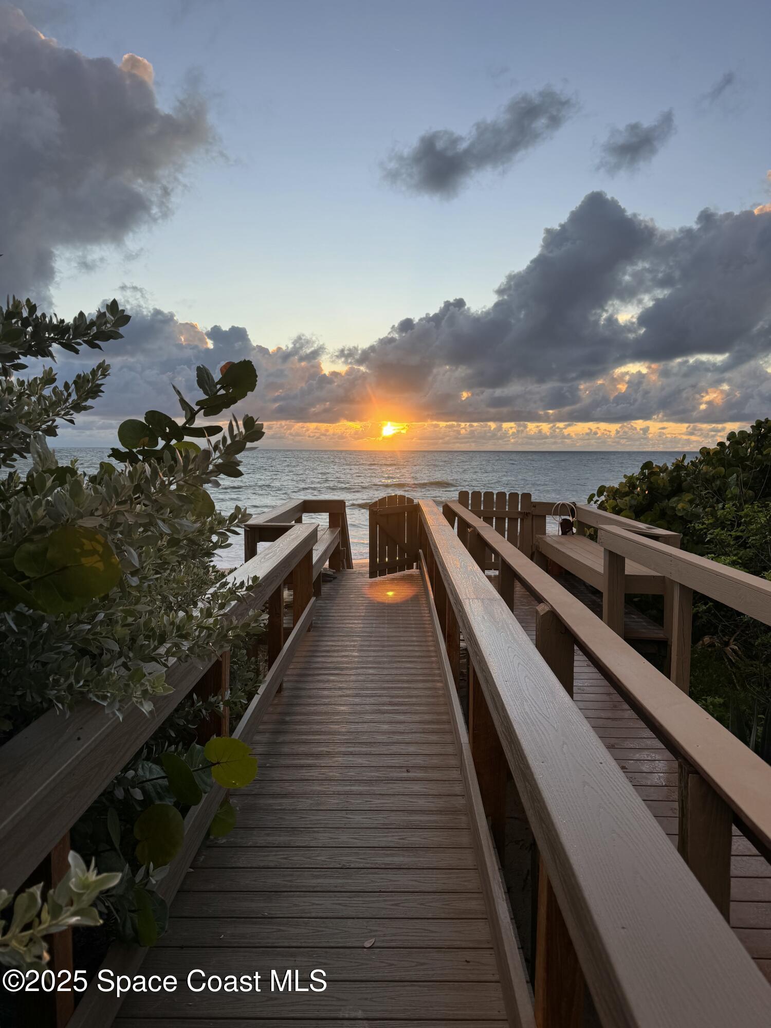 171 Seaview Street Melbourne Beach, FL 32951 - Photo 41 of 44 a view of a balcony with wooden floor