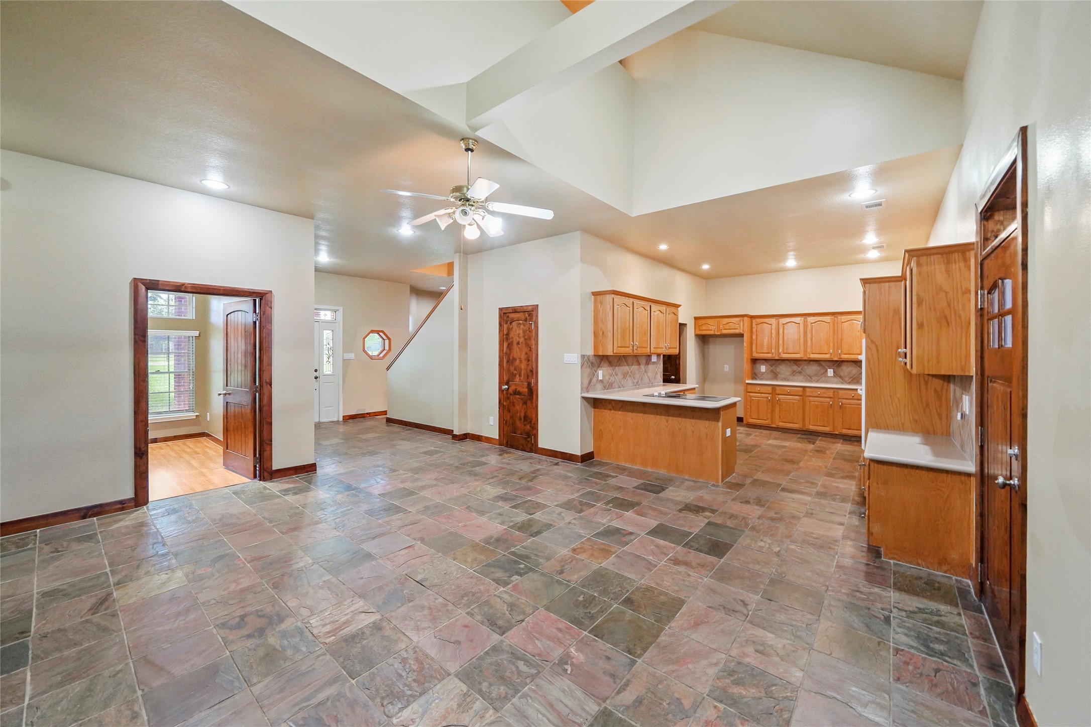 19250 Becker Road Hockley, TX 77447 - Photo 20 of 38 a view of a kitchen with a refrigerator and a sink