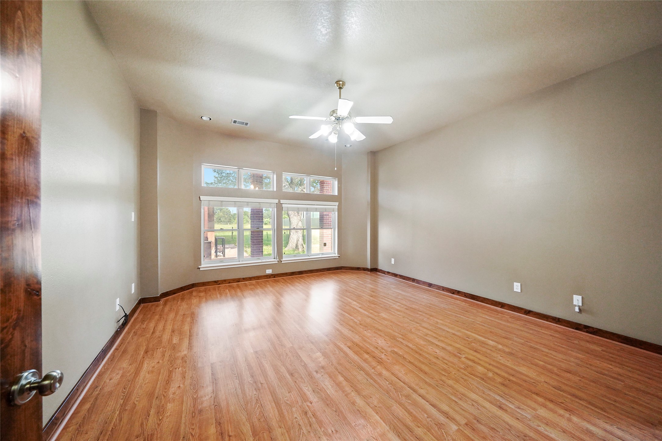 19250 Becker Road Hockley, TX 77447 - Photo 25 of 38 wooden floor in an empty room with a window