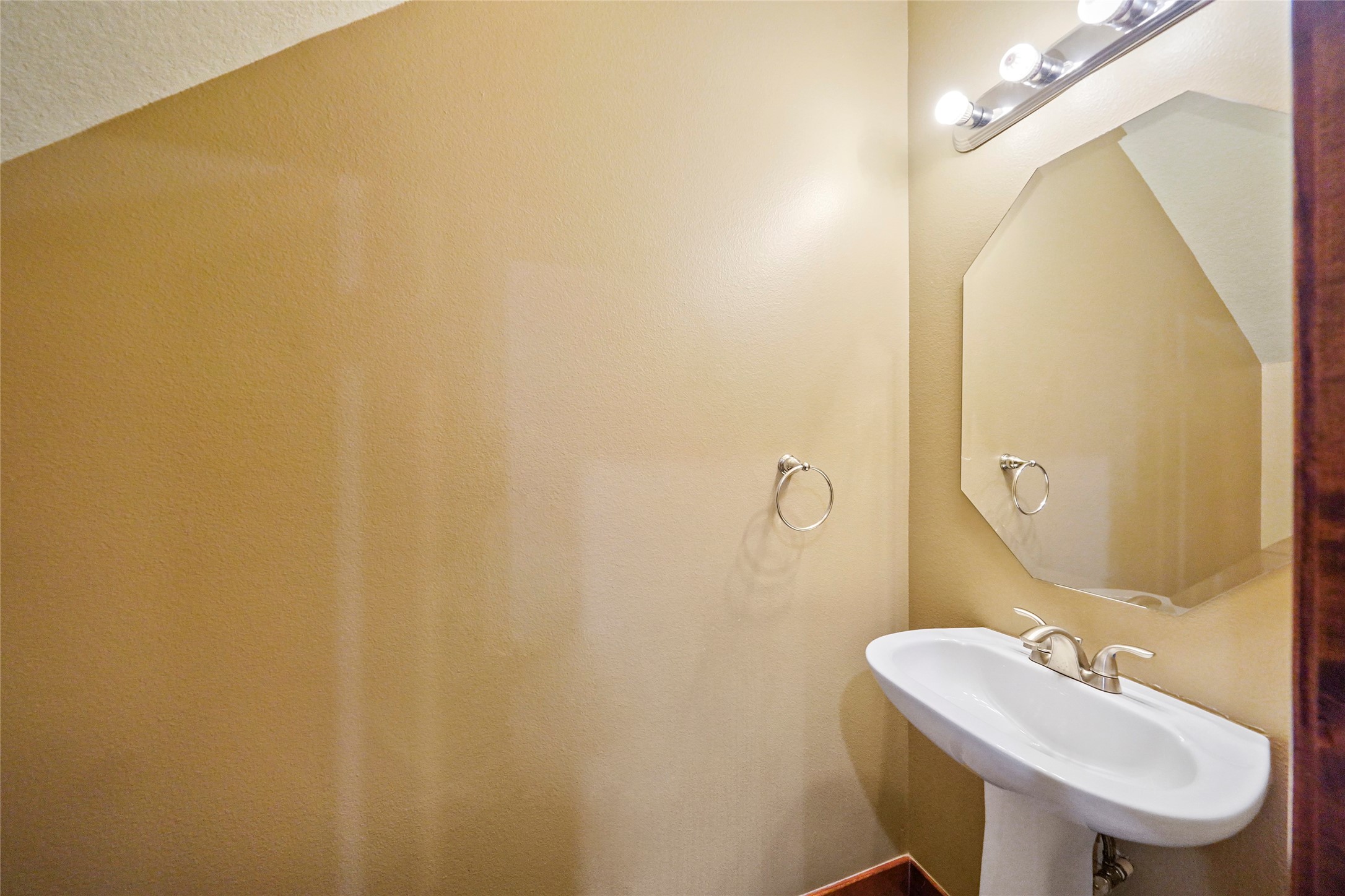 19250 Becker Road Hockley, TX 77447 - Photo 29 of 38 a bathroom with a sink and a mirror