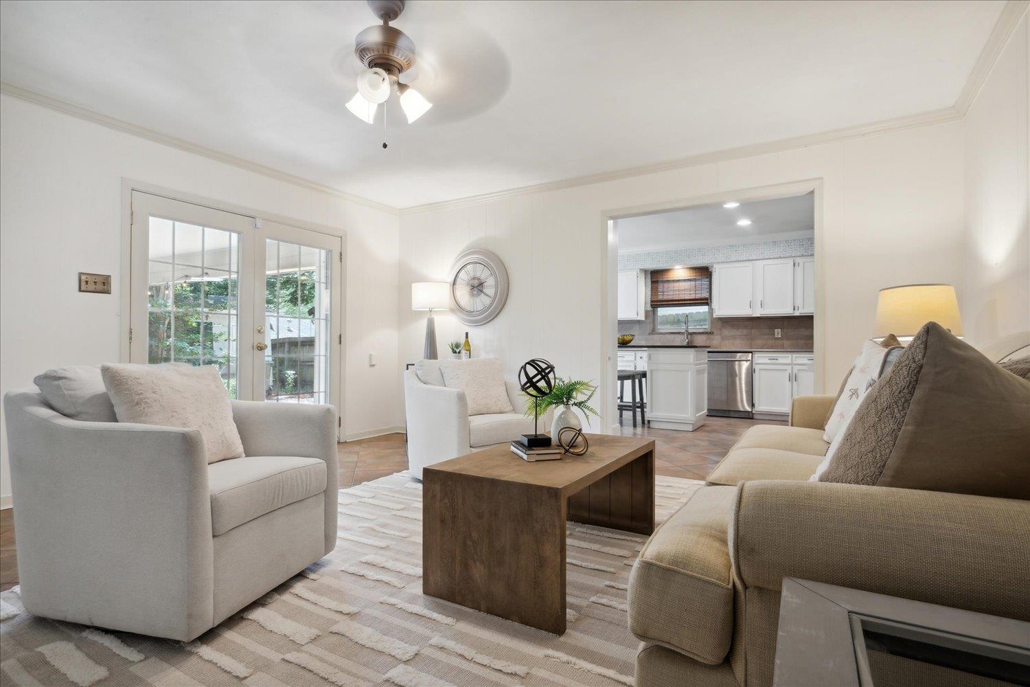 5517 Normandy Road Memphis, TN 38120 - Photo 11 of 24 a living room with furniture and a large window