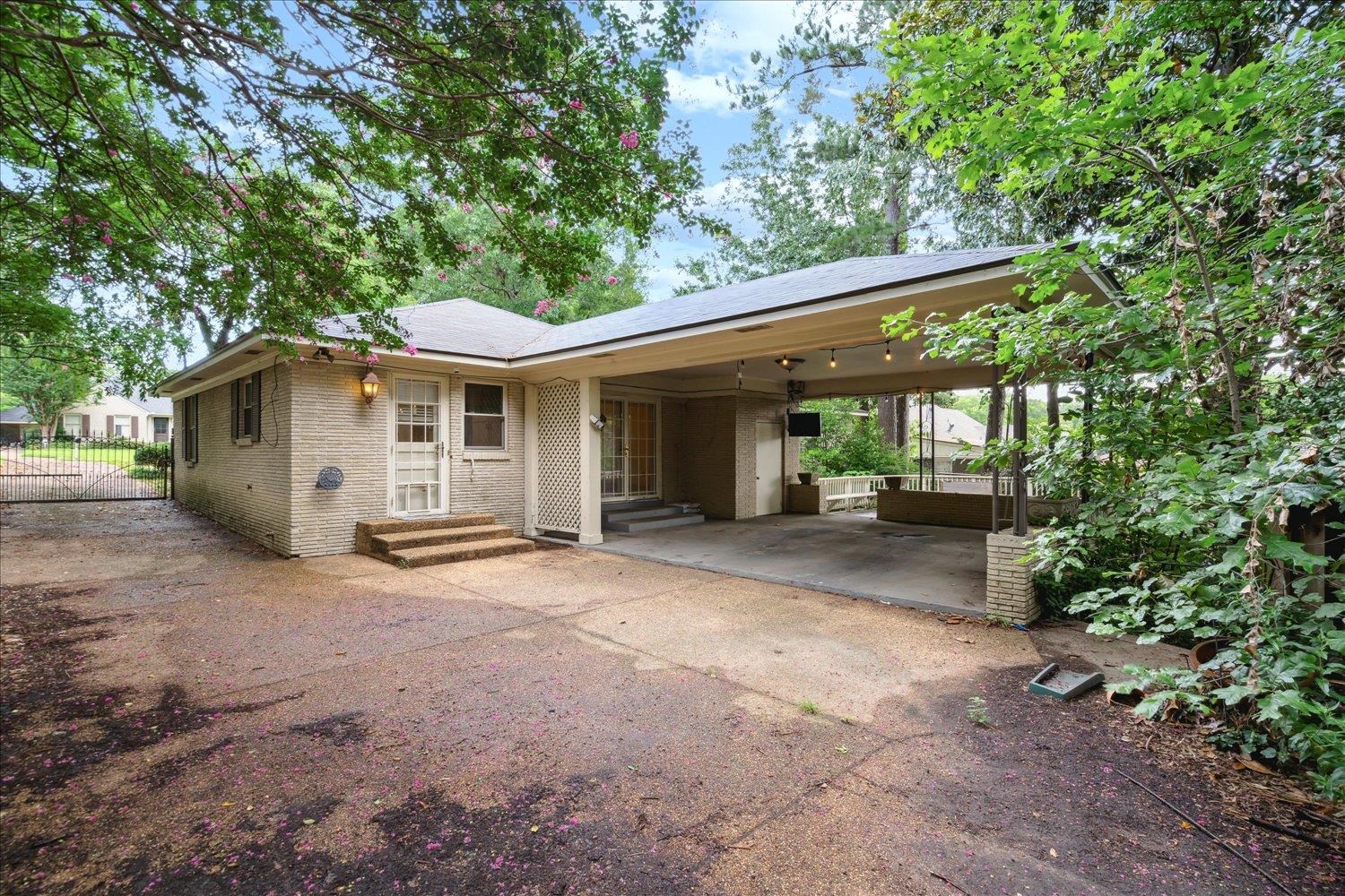5517 Normandy Road Memphis, TN 38120 - Photo 24 of 24 a view of a house with a backyard