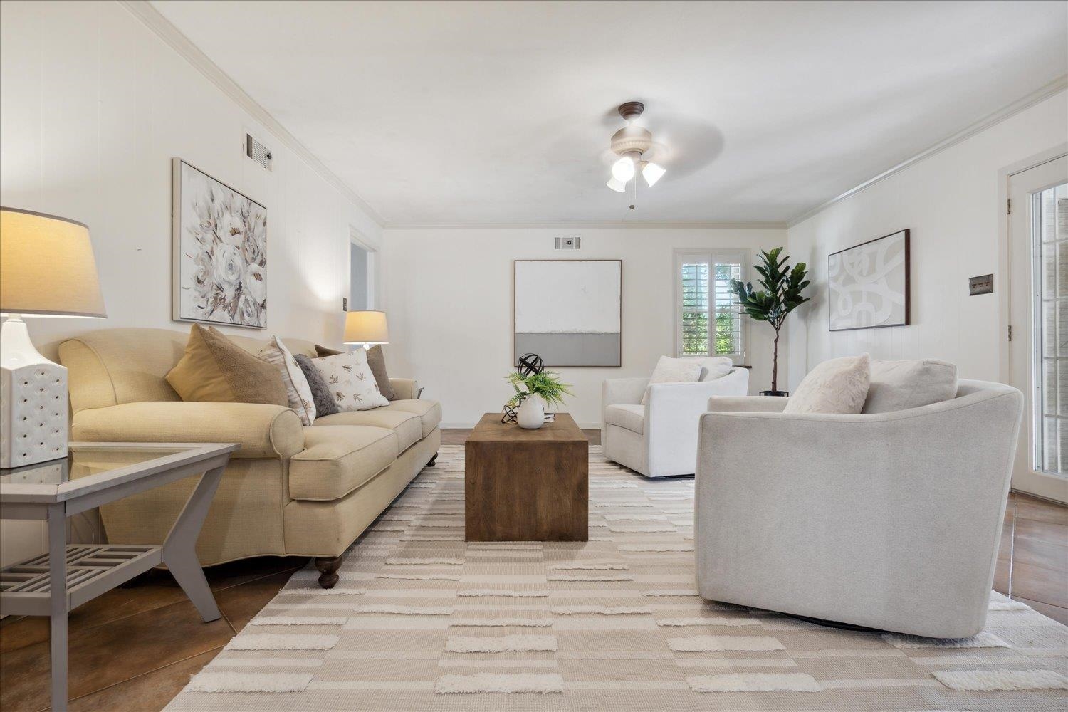 5517 Normandy Road Memphis, TN 38120 - Photo 9 of 24 a living room with furniture and a chandelier