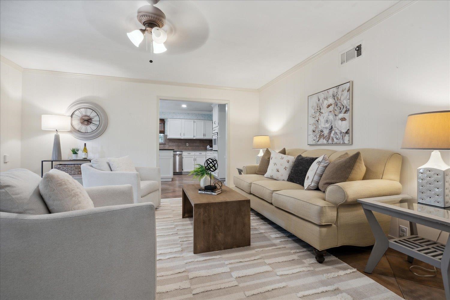 5517 Normandy Road Memphis, TN 38120 - Photo 10 of 24 a living room with furniture and a wooden floor
