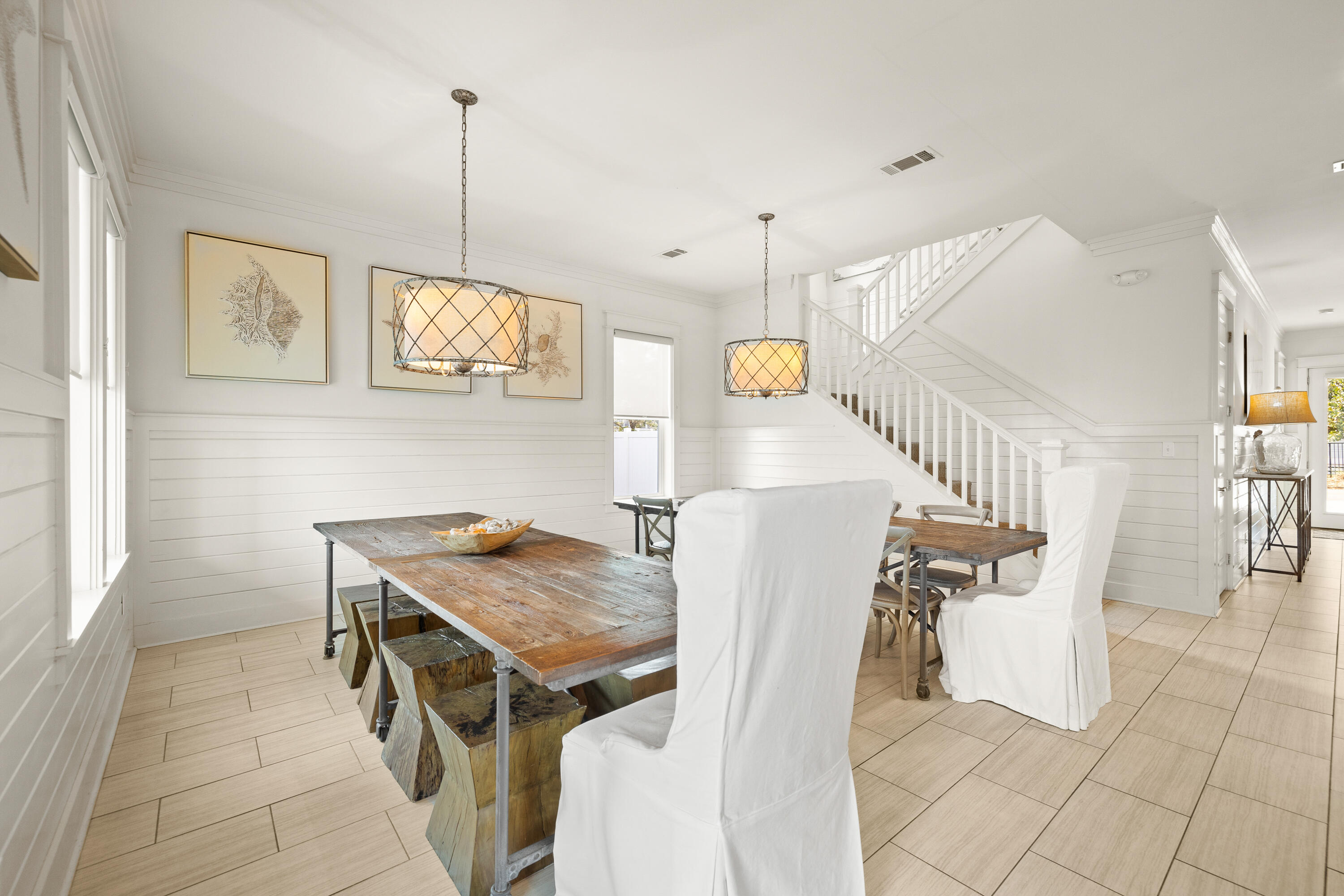 114 South Wall Street Inlet Beach, FL 32461 - Photo 23 of 62 a view of a dining room with furniture and wooden floor