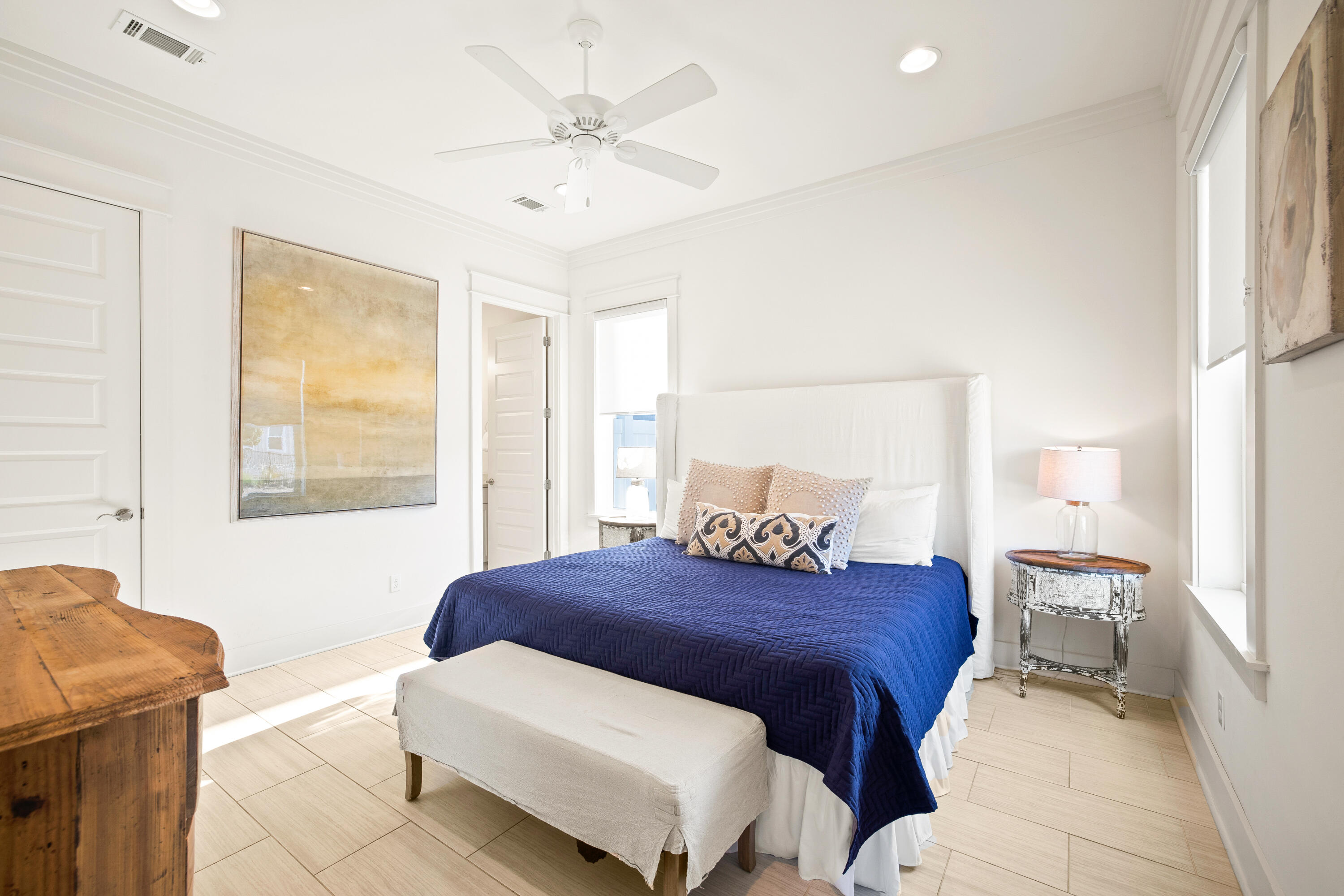114 South Wall Street Inlet Beach, FL 32461 - Photo 31 of 62 a bedroom with a bed and wooden floor