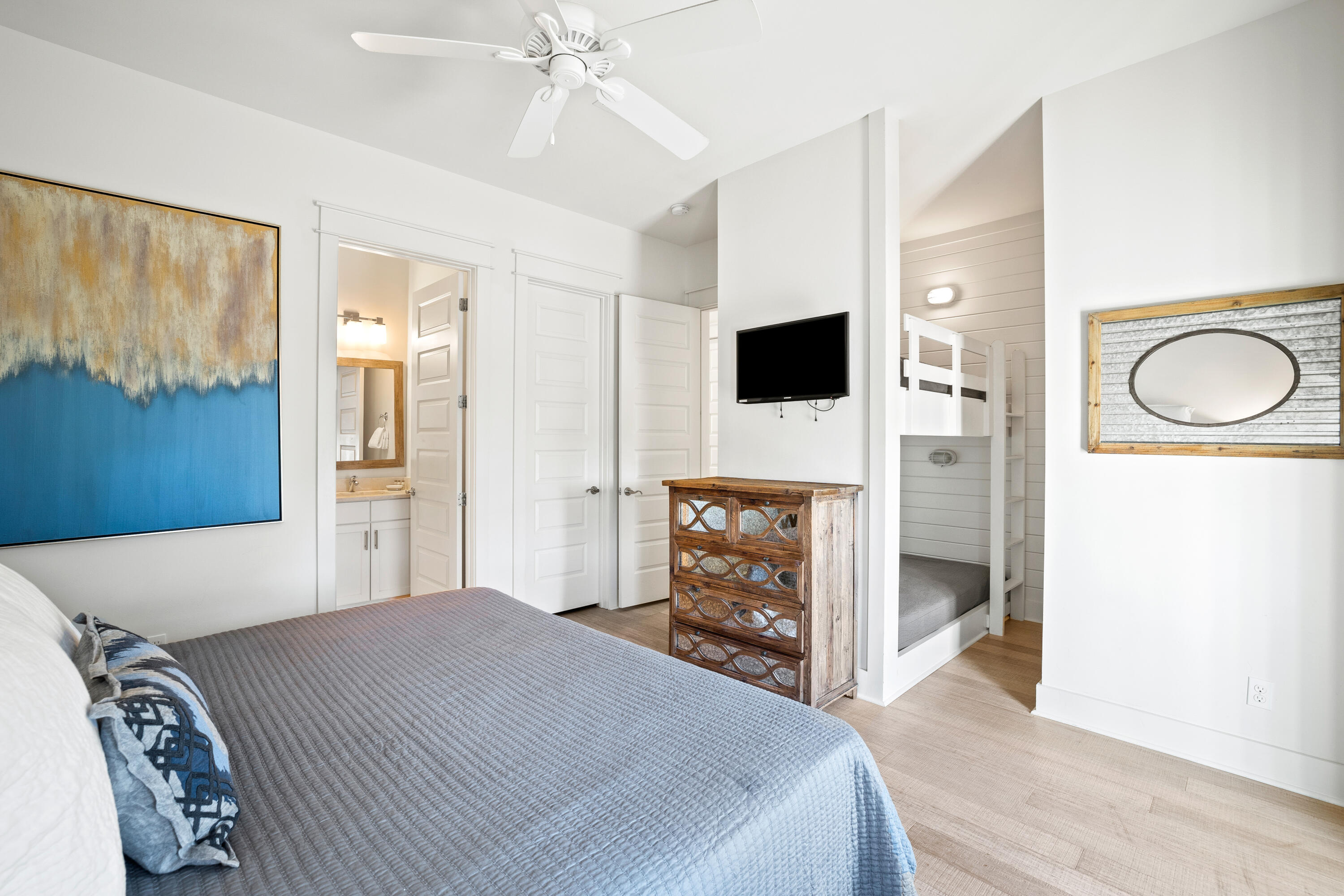 114 South Wall Street Inlet Beach, FL 32461 - Photo 37 of 62 a bedroom with a bed and a flat screen tv