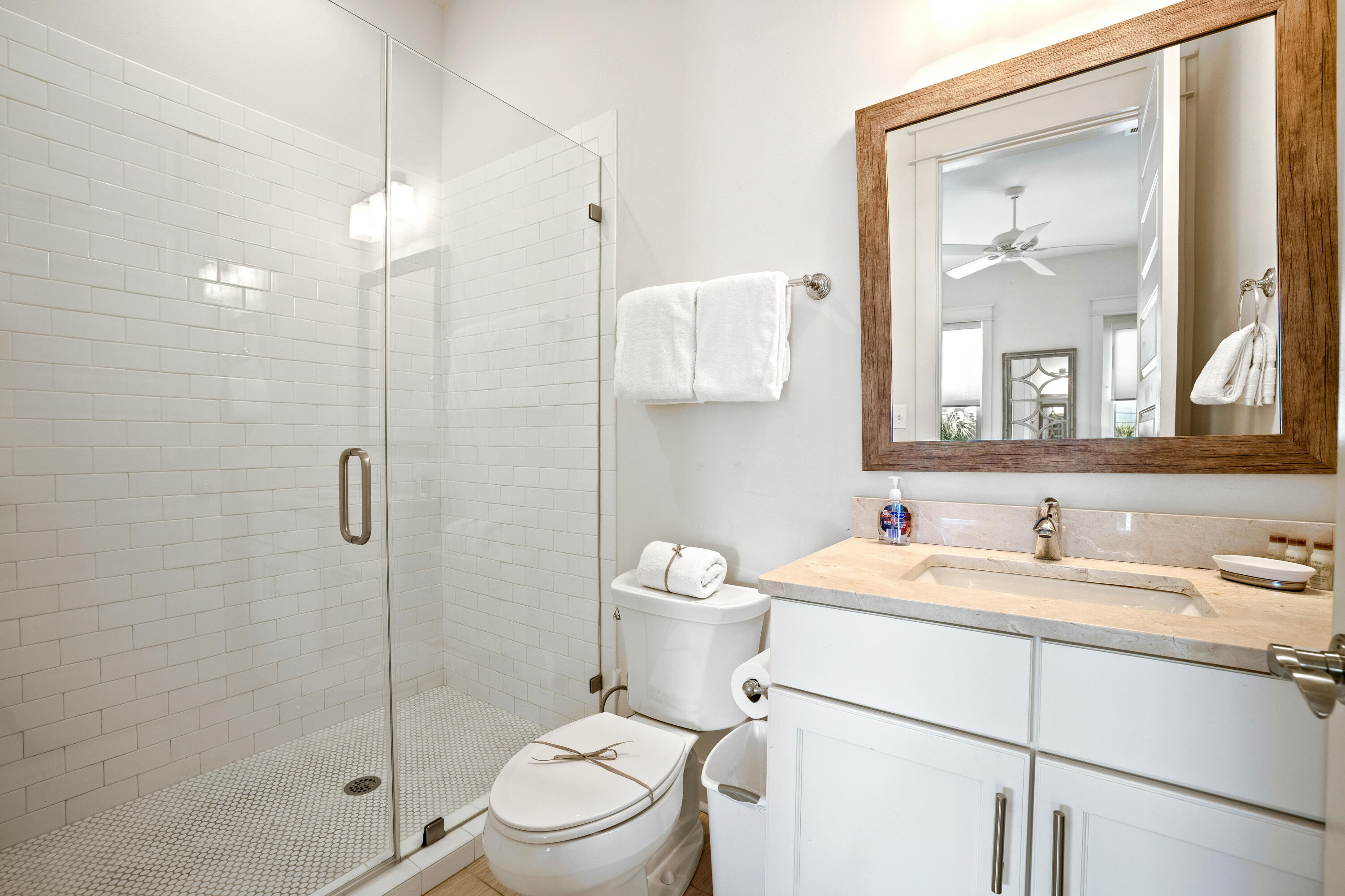 114 South Wall Street Inlet Beach, FL 32461 - Photo 39 of 62 a bathroom with a sink toilet and shower