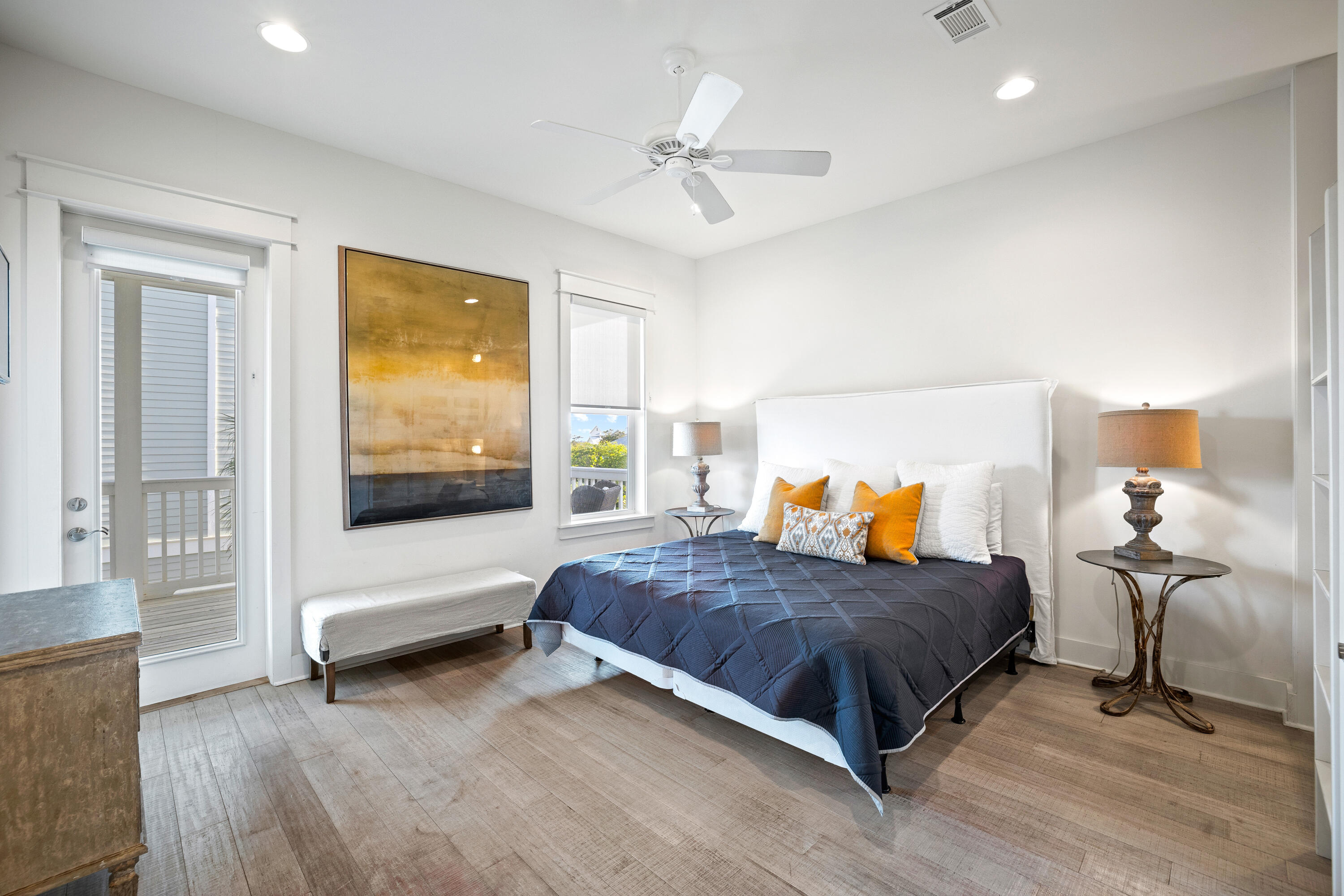 114 South Wall Street Inlet Beach, FL 32461 - Photo 40 of 62 a bedroom with a bed and a chandelier