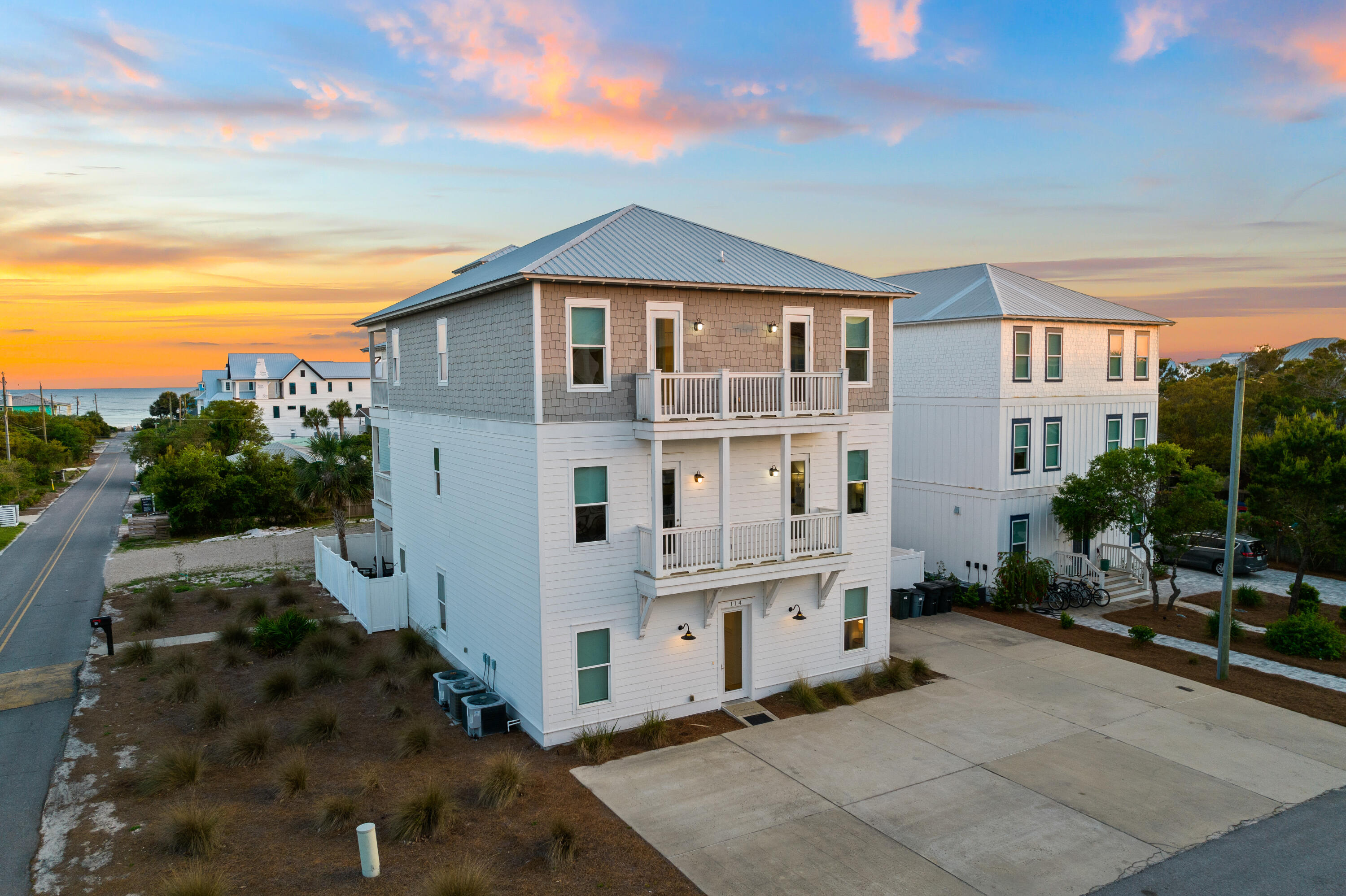 114 South Wall Street Inlet Beach, FL 32461 - Photo 4 of 62 a front view of a house with a yard