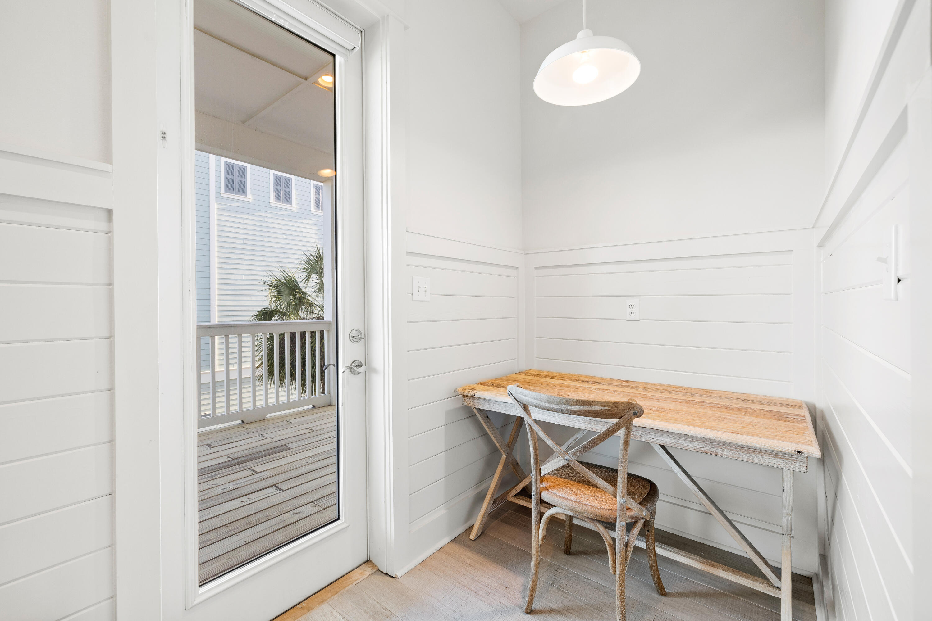 114 South Wall Street Inlet Beach, FL 32461 - Photo 48 of 62 a view of a room with a table and chairs
