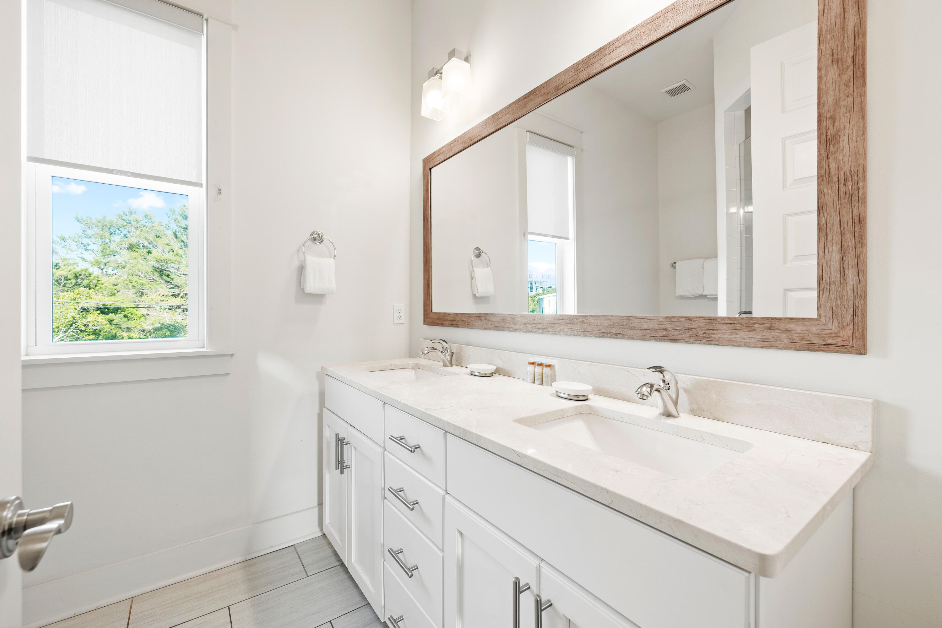 114 South Wall Street Inlet Beach, FL 32461 - Photo 49 of 62 a bathroom with a sink and a mirror