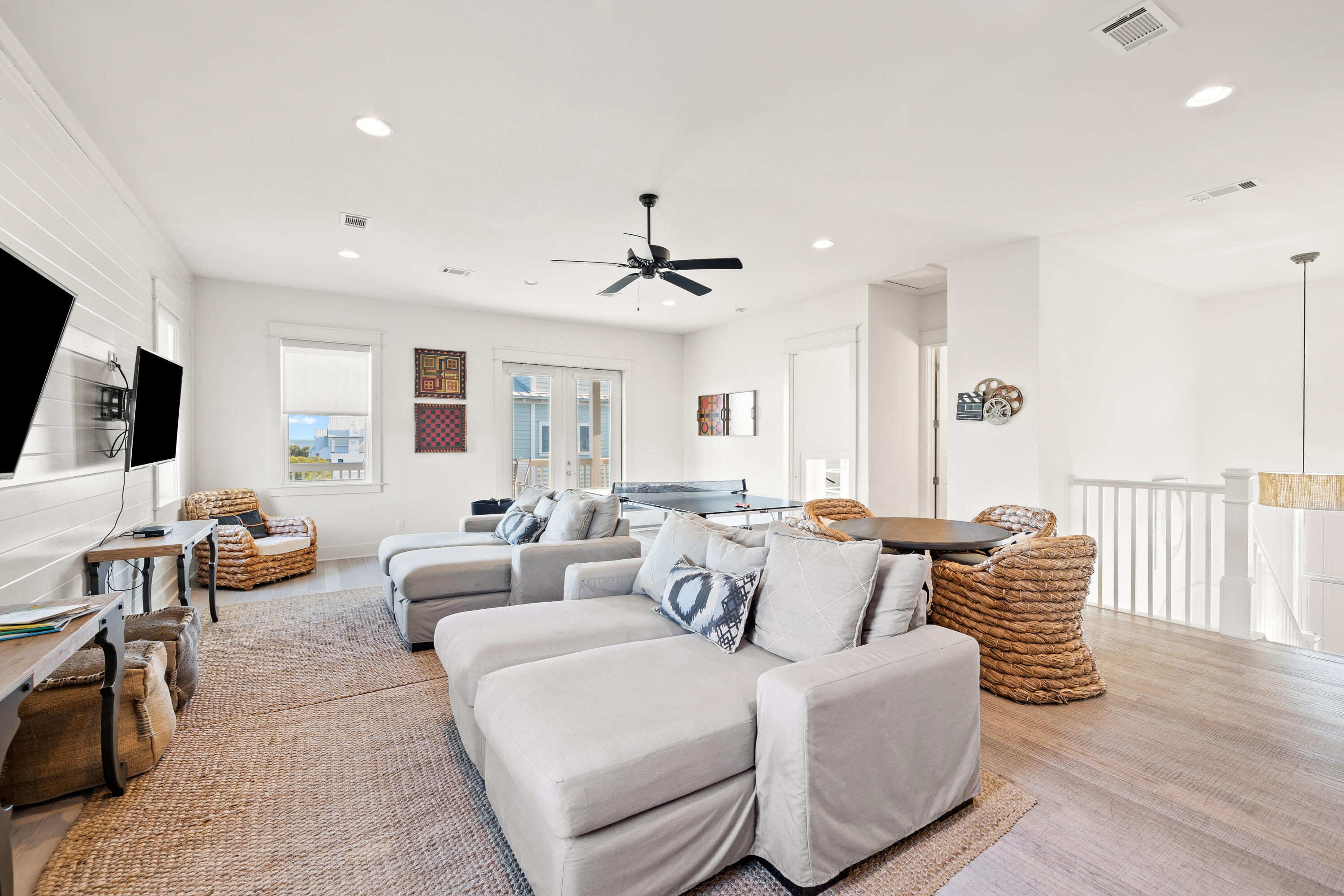 114 South Wall Street Inlet Beach, FL 32461 - Photo 51 of 62 a living room with furniture and a flat screen tv