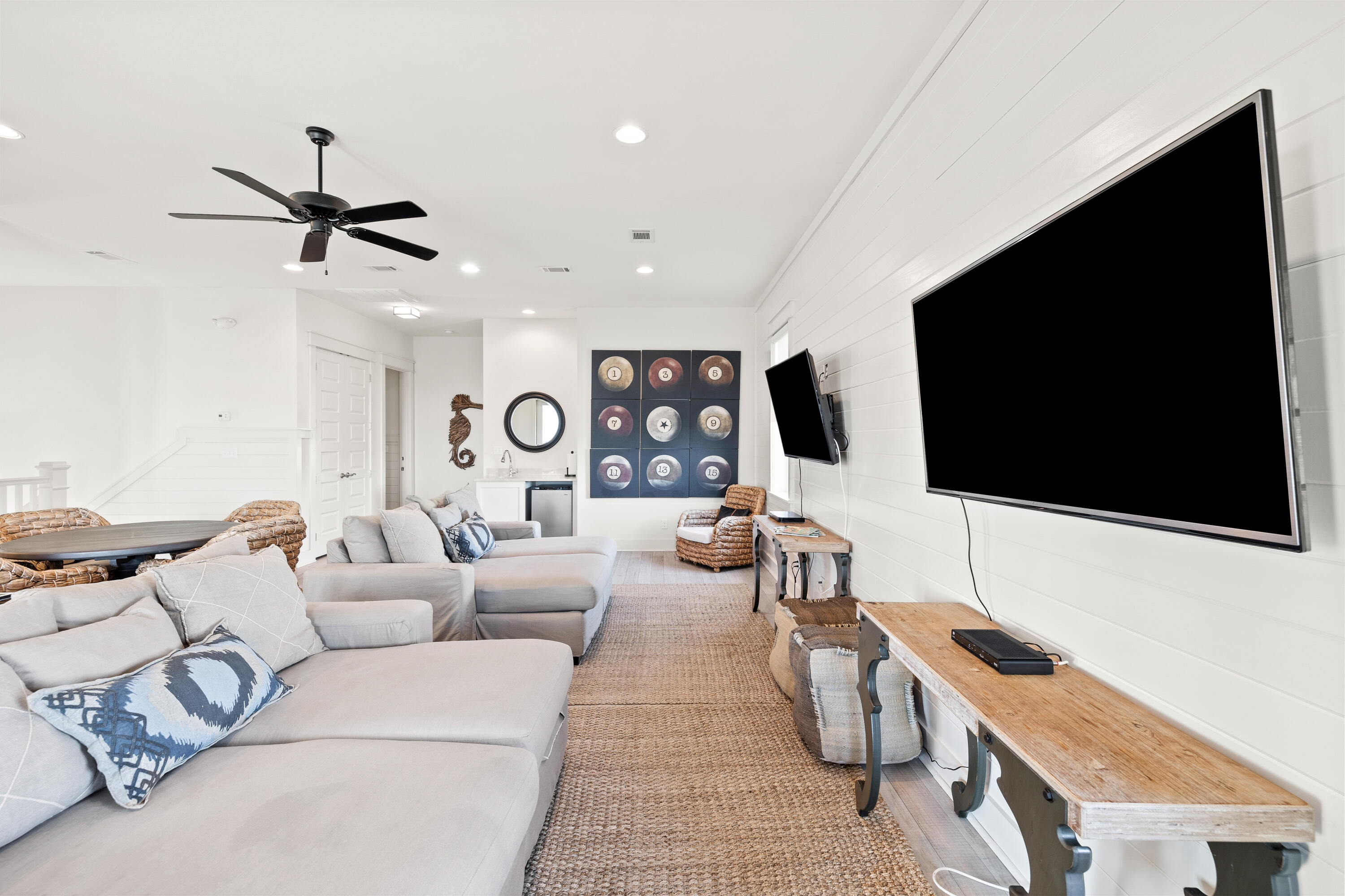 114 South Wall Street Inlet Beach, FL 32461 - Photo 52 of 62 a living room with furniture and a flat screen tv