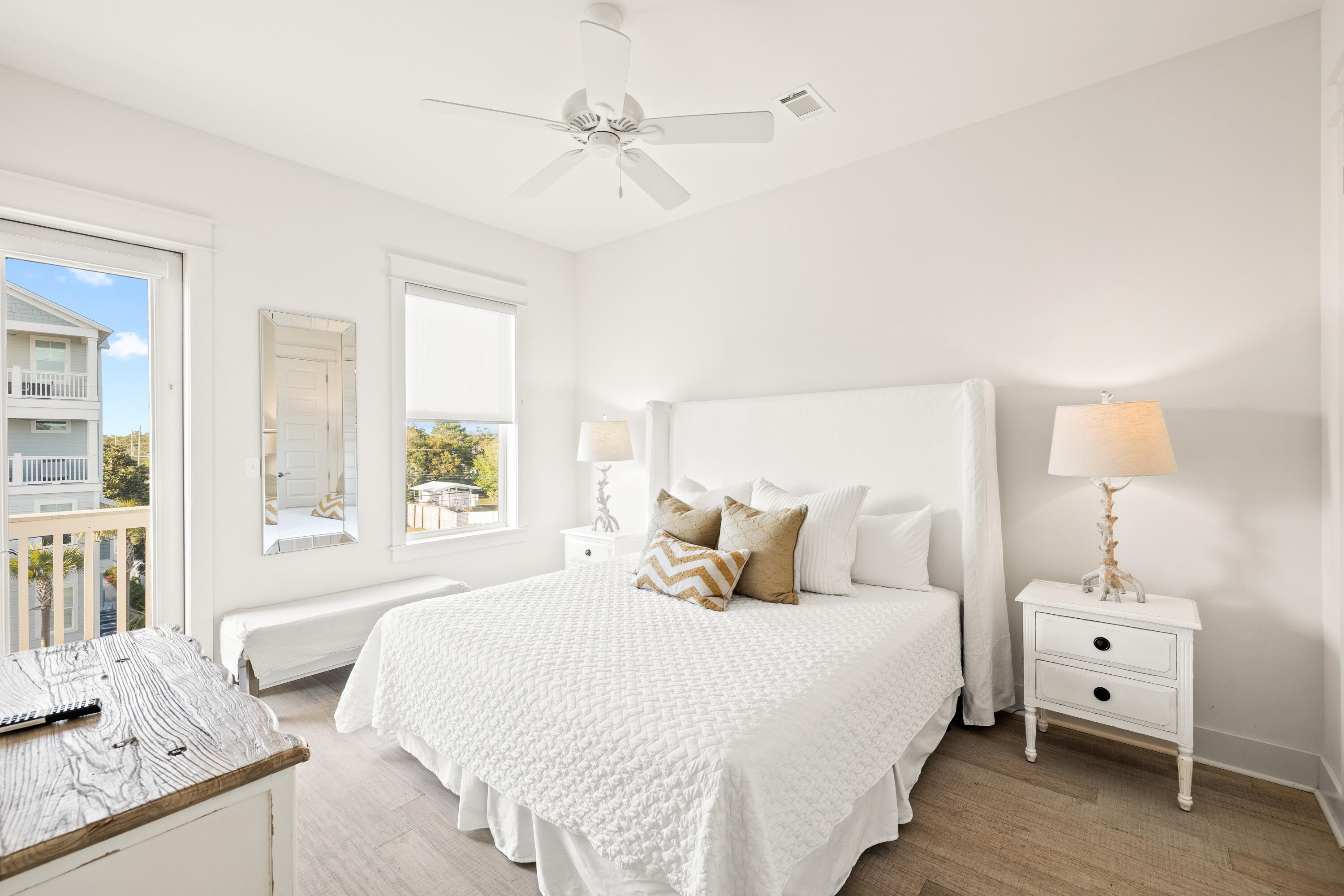 114 South Wall Street Inlet Beach, FL 32461 - Photo 58 of 62 a bedroom with a bed and a window