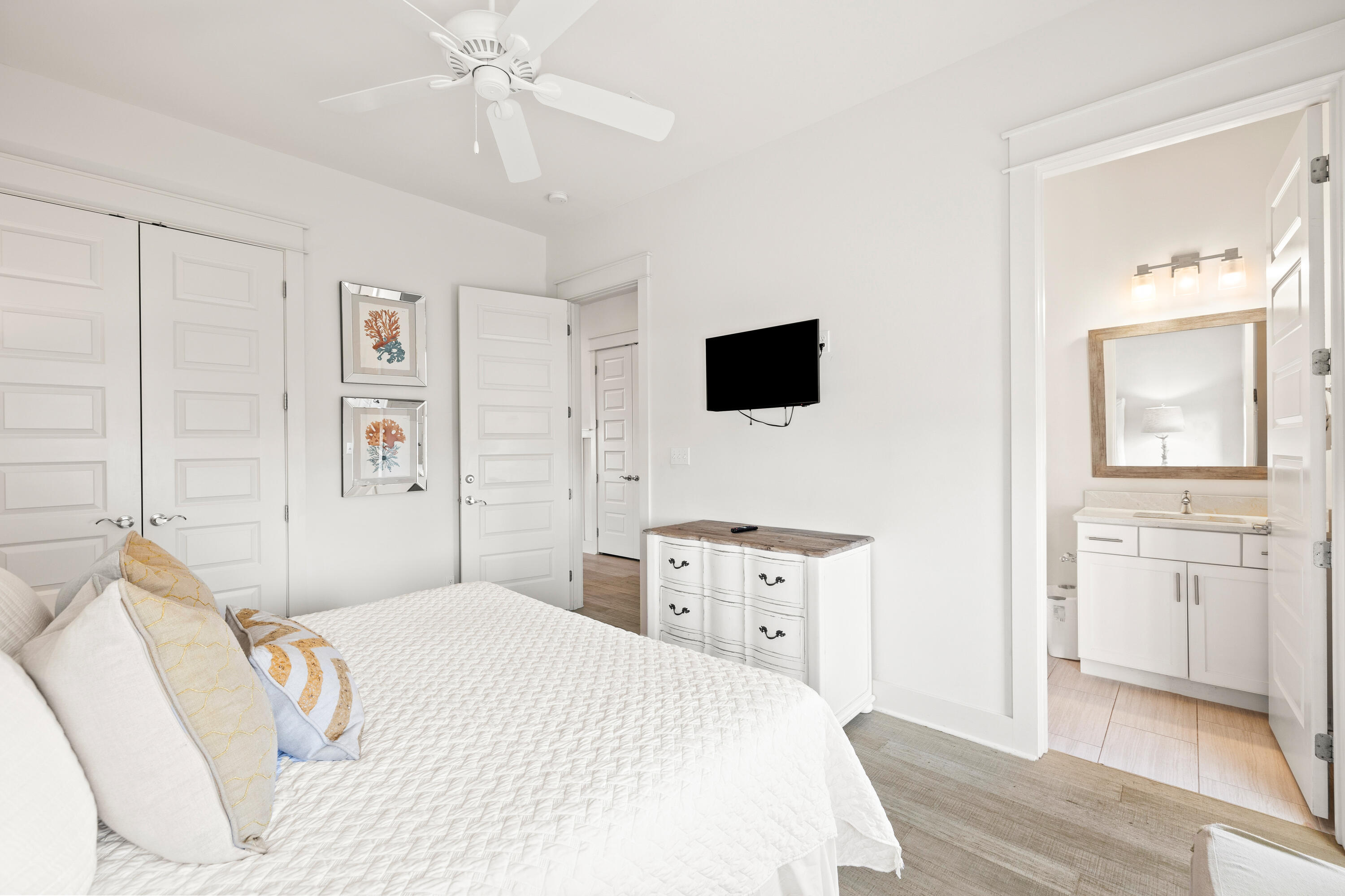 114 South Wall Street Inlet Beach, FL 32461 - Photo 59 of 62 a bedroom with a bed and a flat screen tv
