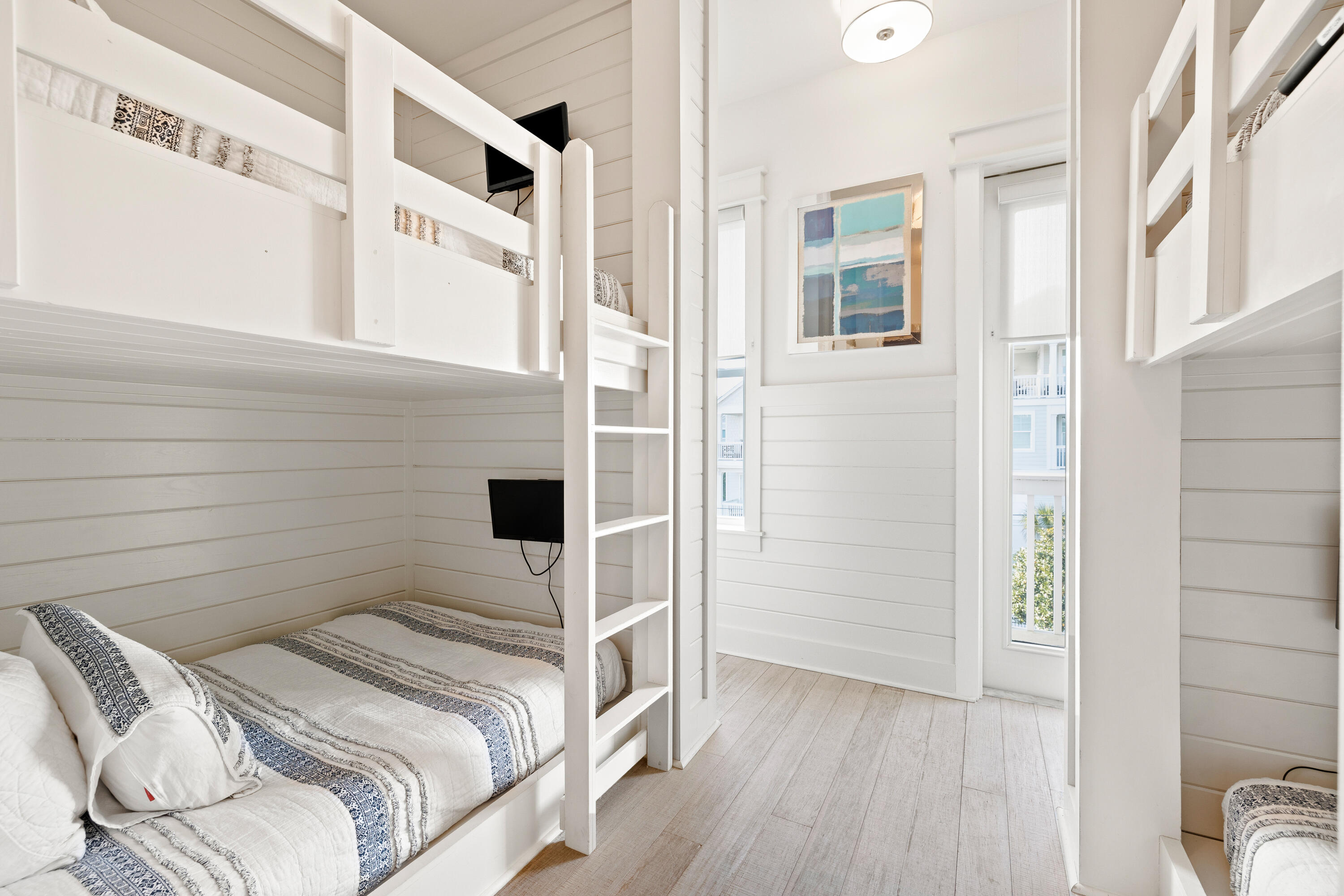 114 South Wall Street Inlet Beach, FL 32461 - Photo 61 of 62 a bedroom with a bed and a large window