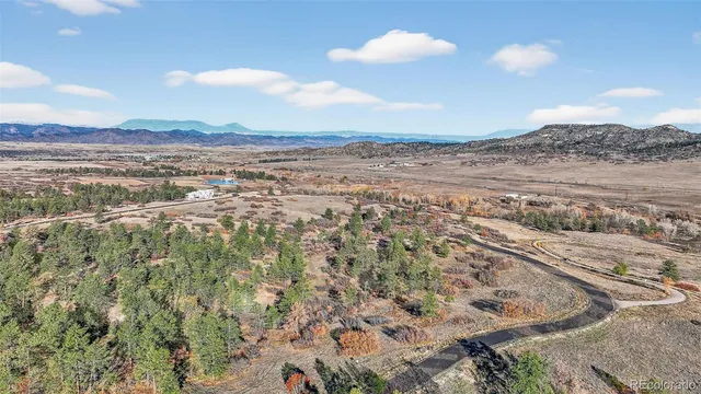 a view of ocean and mountain