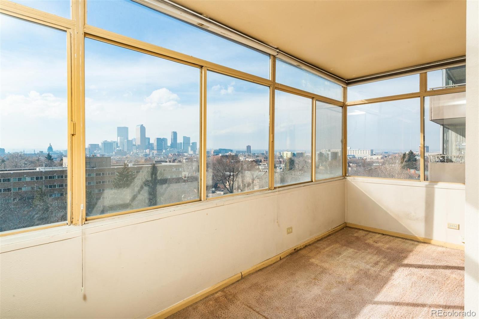 1313 North Williams Street, Unit 906 Denver, CO 80218 - Photo 13 of 31 a view of a city from a balcony