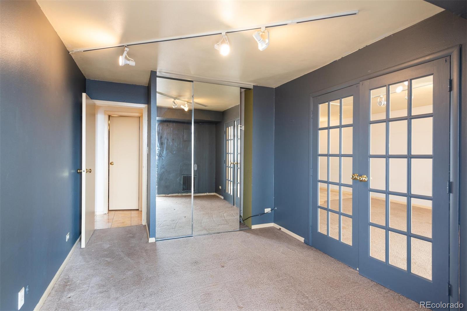 1313 North Williams Street, Unit 906 Denver, CO 80218 - Photo 17 of 31 a view of a bathroom with a large window and shower