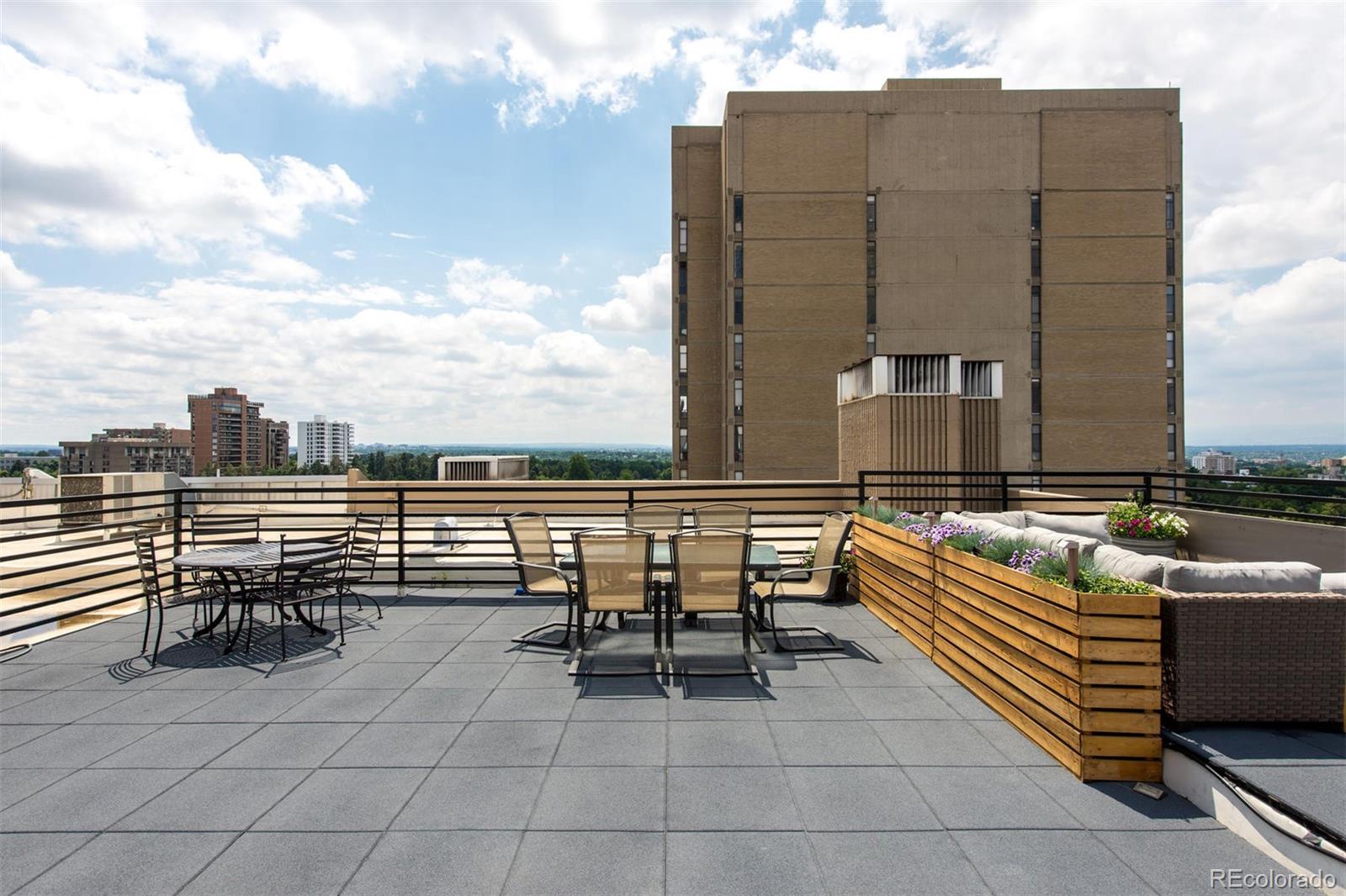 1313 North Williams Street, Unit 906 Denver, CO 80218 - Photo 30 of 31 a view of roof with seating space and barbeque oven