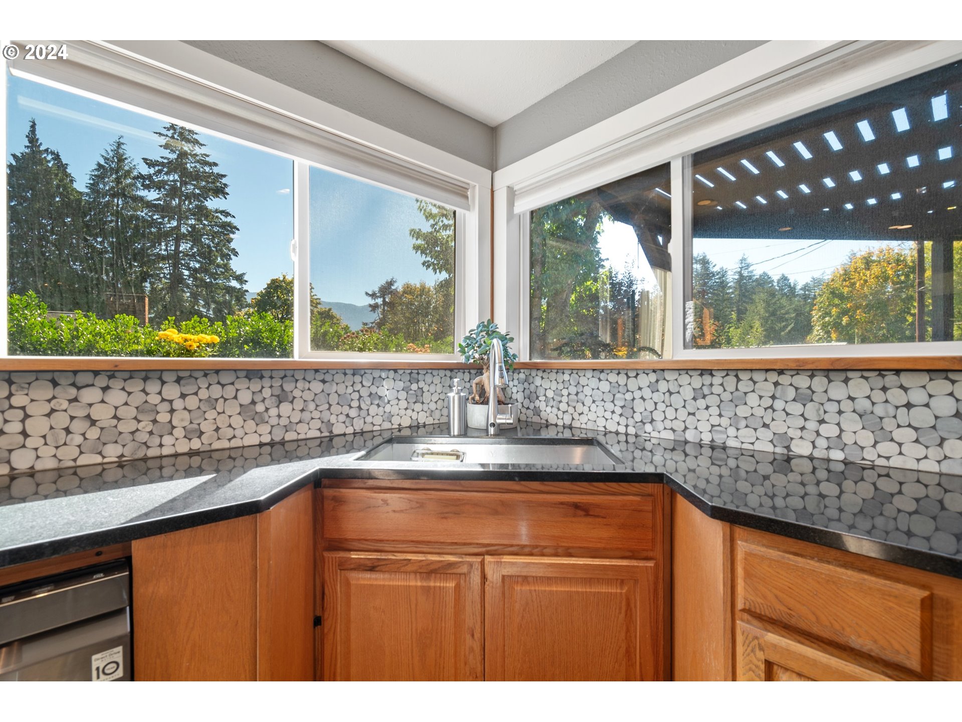 450 Frank Johns Road Stevenson, WA 98648 - Photo 13 of 36 a kitchen with a sink and large window