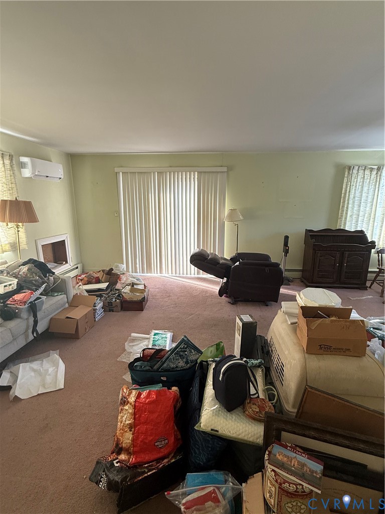 654 Scarlet Oak Road Richmond, VA 23235 - Photo 2 of 12 a living room with furniture