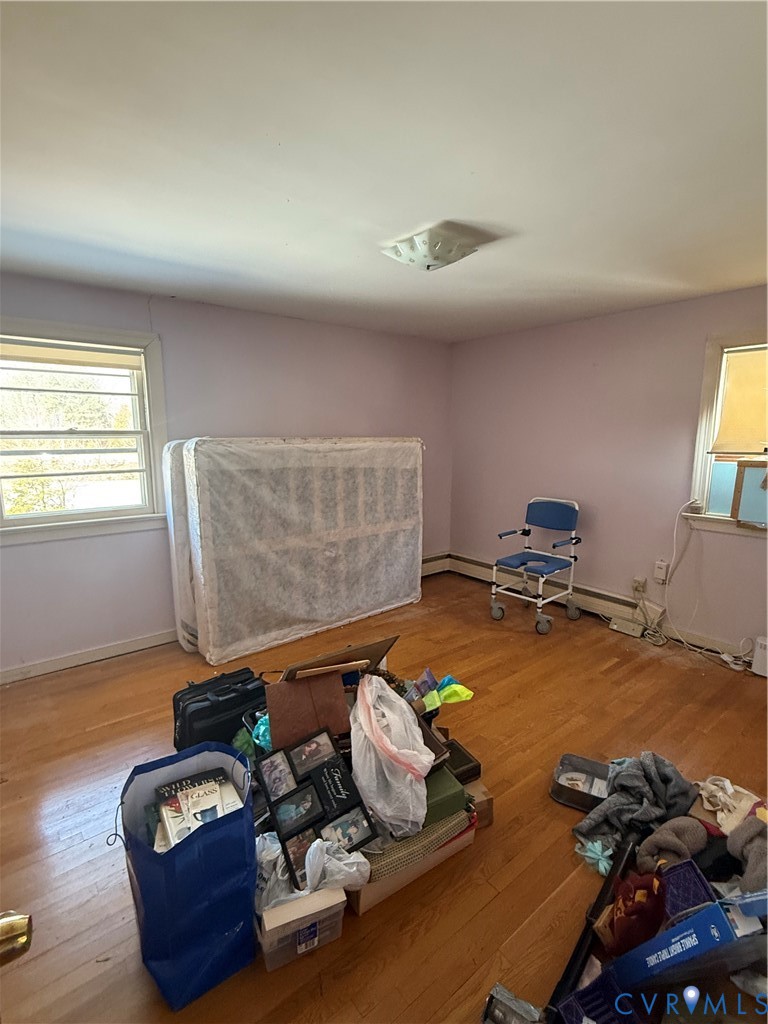 654 Scarlet Oak Road Richmond, VA 23235 - Photo 7 of 12 a room with furniture and a window