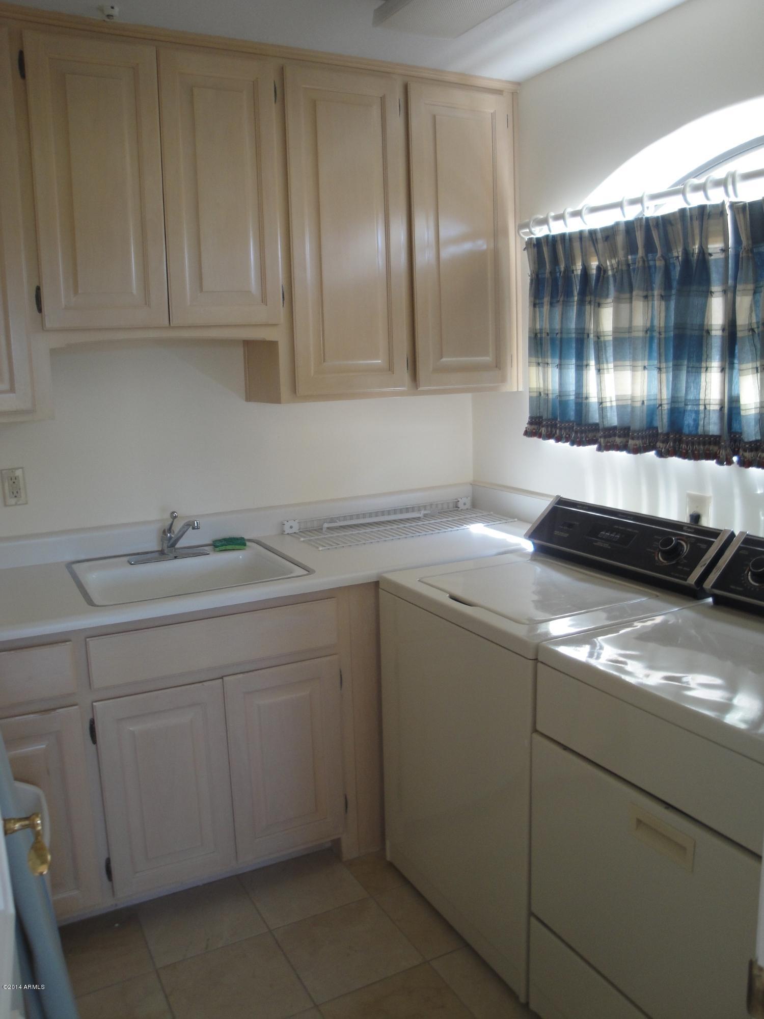 7878 East Gainey Ranch Road, Unit 37 Scottsdale, AZ 85258 - Photo 43 of 59 LAUNDRY ROOM