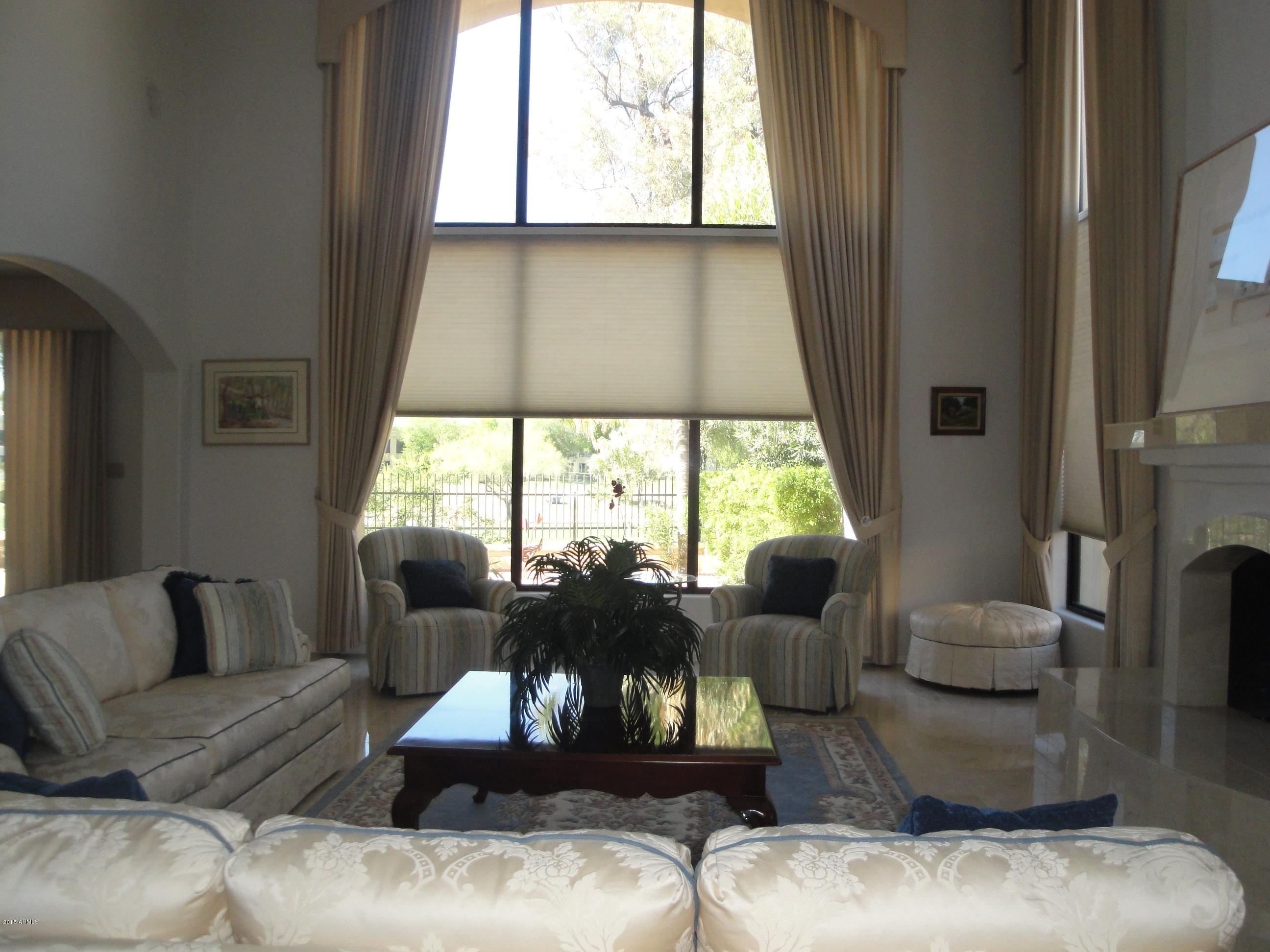 7878 East Gainey Ranch Road, Unit 37 Scottsdale, AZ 85258 - Photo 9 of 59 WALL OF WINDOWS FROM LIVING AREA