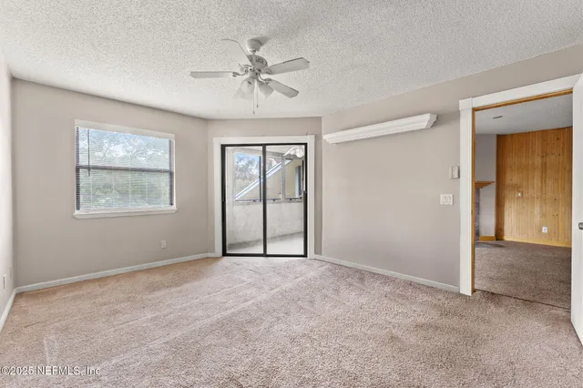 a view of an empty room with window