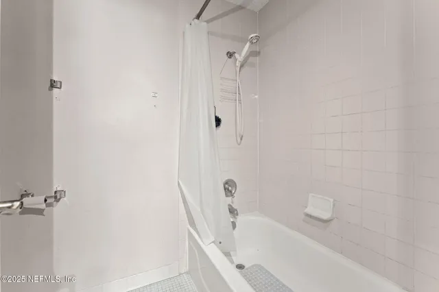 a bathroom with a bathtub