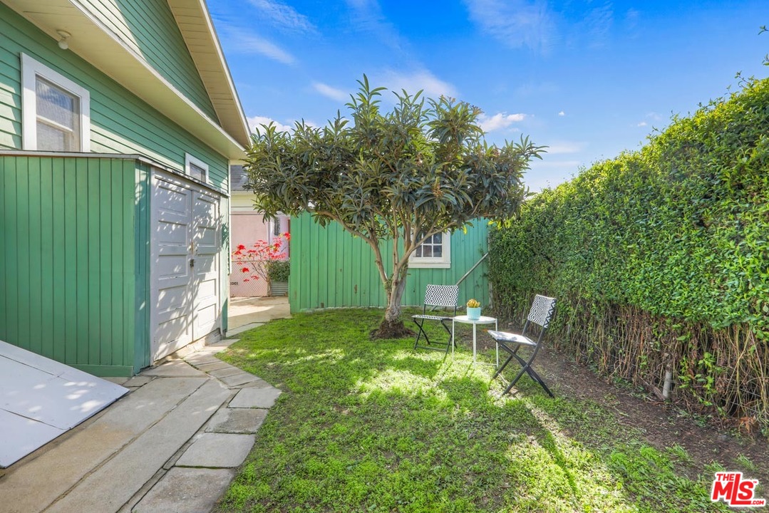 755 East Kensington Road Los Angeles, CA 90026 - Photo 23 of 25 a backyard of a house with outdoor seating