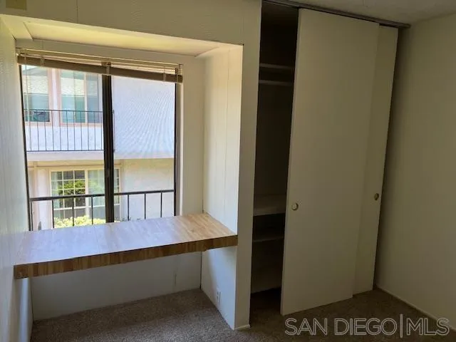 9564 Easter Way San Diego, CA 92121 - Photo 14 of 16 a view of balcony with furniture