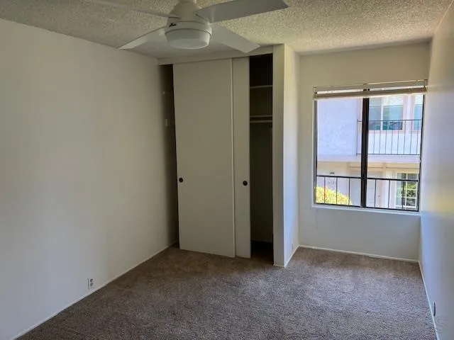 9564 Easter Way San Diego, CA 92121 - Photo 16 of 16 an empty room that has a window in it