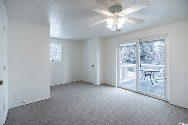 730 North 200 East Logan, UT 84321 - Photo 56 of 67 Upstairs bedroom with deck