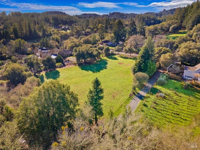 a view of a lake with mountains in the background