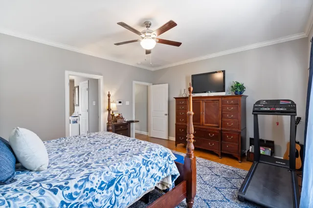 a bathroom with a tub and a view of bathroom