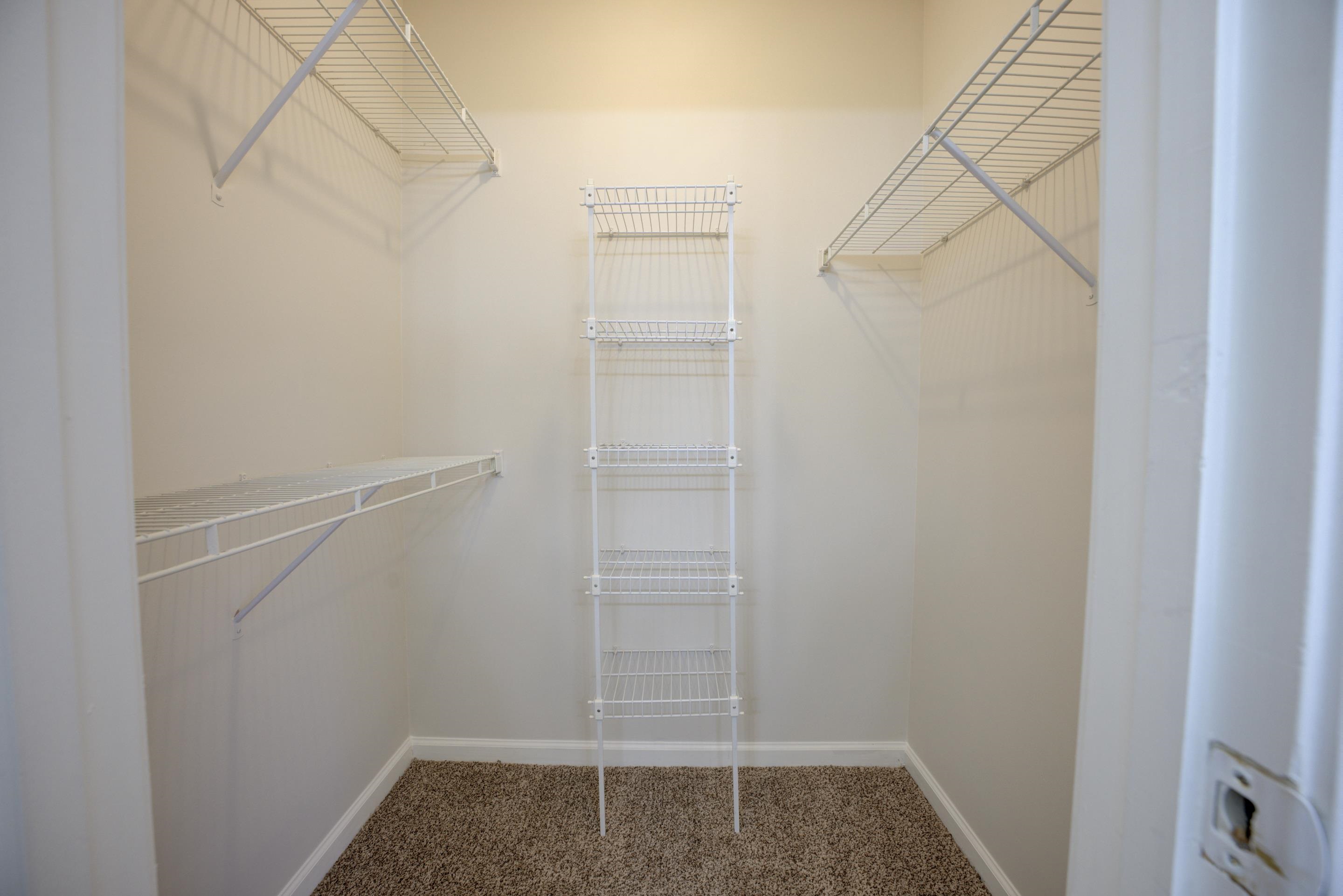 7555 Reese Road Memphis, TN 38133 - Photo 13 of 22 Walk in closet featuring carpet